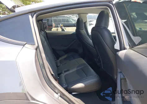 2023 Tesla Model Y Awd/Long Range Dual Motor All-Wheel Drive z USA, uszkodzony, nr VIN 7SAYGDEE3PA183786